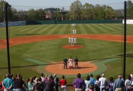 The Union University Bulldogs stand at attention during the National Anthem at Fesmire Field. - Photo by Steven Aldridge