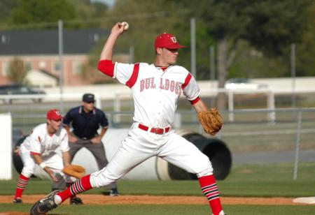 Senior Carl Harken throws a pitch to the plate during a game. - Photo by Steven Aldridge