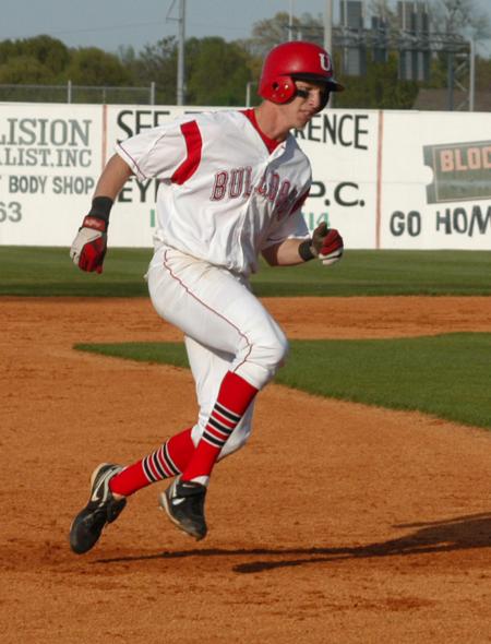 Corey Rudolph heads into third base. - Photo by Steven Aldridge