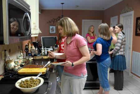 Rebecca Eaton, sophomore mathematics major, partakes in a wonderful meal prepared by Alice Nettles, wife of professor Bill Nettes.  The Nettles hosted students as a part of Be Our Guest. - Photo by Kristi McMurry Woody