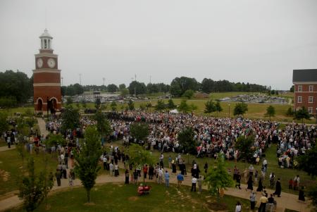 Graduates file onto the Great Lawn for spring graduation. - Photo by Angela Abbamonte