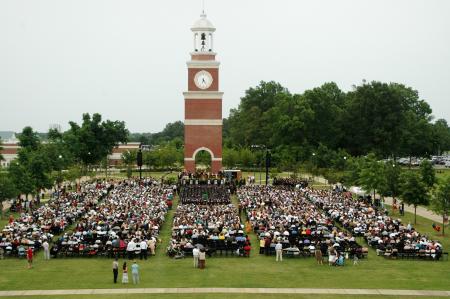 Family and students braved potential inclement weather during the spring graduation ceremony on Saturday, May 23, 2009. - Photo by Beth Spain