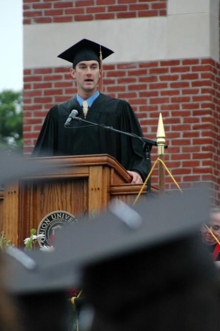 President of the senior class, Andrew Courtner, addresses family and students during the spring graduation on Saturday, May 23, 2009. - Photo by Beth Spain
