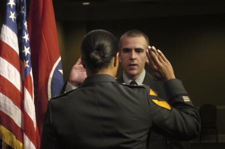 Computer science graduate Jacob Lynn recites his oath to join the army.  Lynn was Union's first graduate to participate in a regional ROTC program. - Photo by Sarah Palmer Goff
