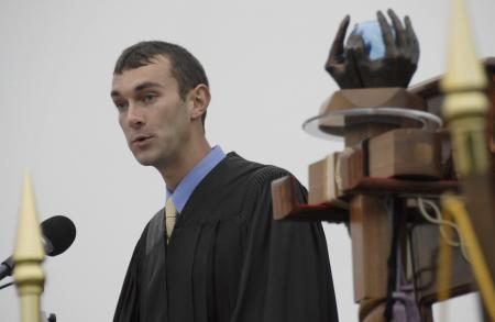 Andrew Courtner, president of the senior class, encouraged his classmates at spring graduation to depend upon the Lord as they face their futures. - Photo by Jim Veneman