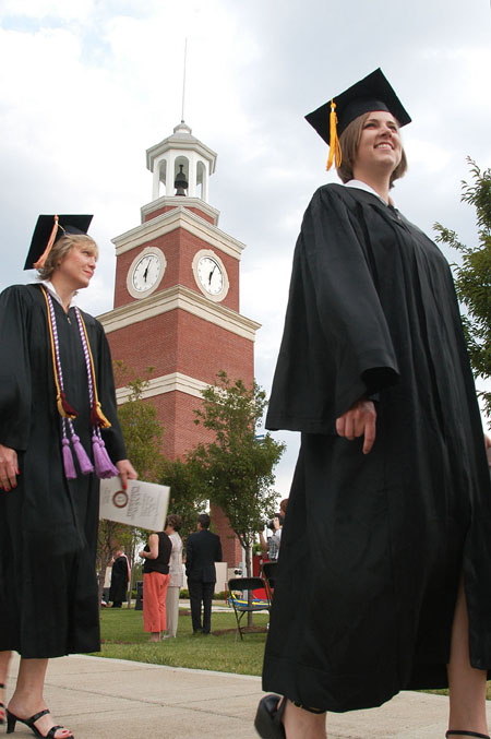 Graduates progress to their chairs on the Great Lawn at Spring Graduation 2003. - Photo by Jim Veneman
