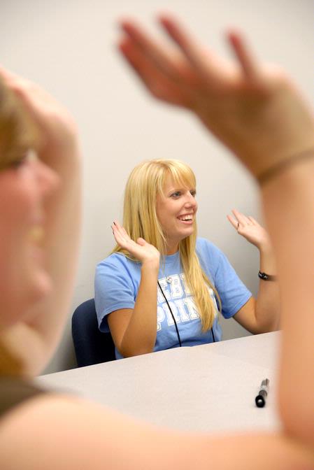 Katy Frayley, freshman, plays a game with her Focus group during orientation for new students. - Photo by Kristi McMurry Woody