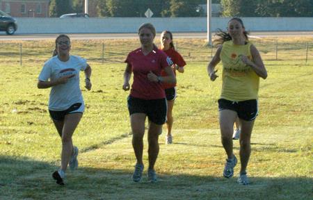 Union women's cross country team runs during an early morning practice. - Photo by Steven Aldridge
