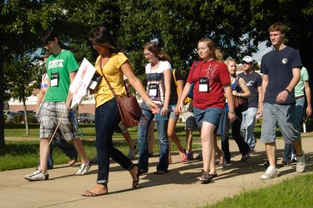 Hailey Gallagher, junior marketing major, leads her Focus group over to Jennings Hall. - Photo by Sarah Palmer Goff