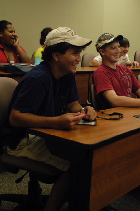Will Thomas, freshman pre-pharmacy major, laughs as he plays a game involving Starburst and sharing random facts about his life in his Focus group. - Photo by Sarah Palmer Goff