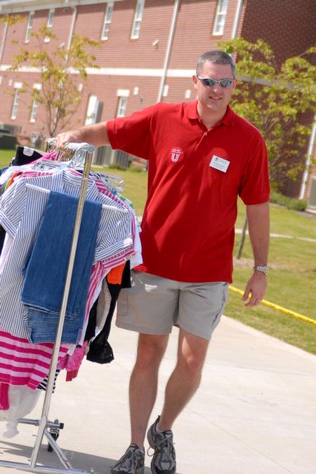 Marc Lockett, assistant biology professor, helps an incoming freshman move things into the dorms on freshman move-in day.
 - Photo by Kristi McMurry Woody