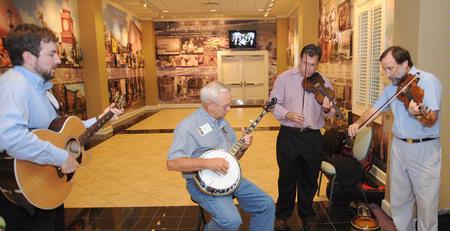 A Union faculty band including Taylor Worley, Gavin Richardson and Hal Poe (along with George Brint) play some opening music for the Faculty/Staff Dinner. - Photo by Morris Abernathy