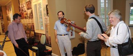 First Lady Lanese Dockery shows her appreciation for the faculty band before the Faculty/Staff Dinner. - Photo by Morris Abernathy