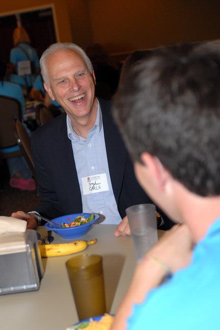 Stephen Carls, university professor of history and department chair, talks with incoming freshmen who are interested in the history department during new student orientation. - Photo by Kristi McMurry Woody