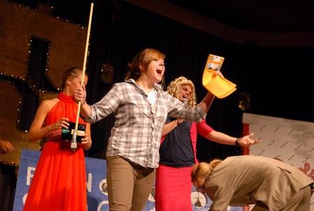 One of the freshman winners celebrates at the SAC game show. This annual game show is a way for freshmen to win prizes and have fun. - Photo by Kristi McMurry Woody