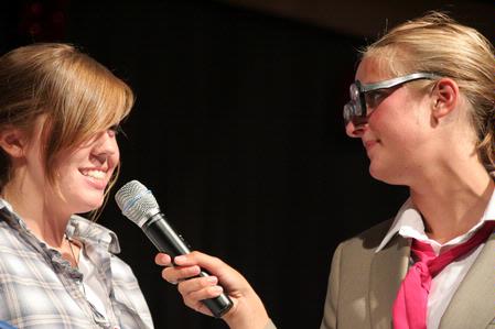 A freshman contestant for the SAC game show answers questions from one of the hosts of the game show. This annual game show is a way for freshmen to win prizes and have fun. - Photo by Kristi McMurry Woody