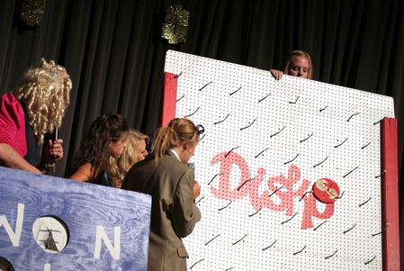 A freshman contestant on Right is the Price, the SAC Game Show, plays Disko. This annual game show is a way for freshmen to win prizes and have fun. - Photo by Kristi McMurry Woody