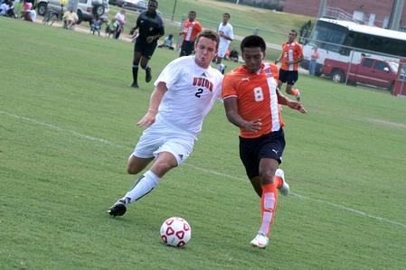 Chris Waugh, sophomore sports medicine major, attempts a steal against Brewton Parker. - Photo by Kristi McMurry Woody