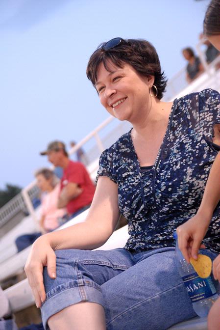 Ashley Blair, assistant professor of communication arts, enjoys a Diamond Jaxx game on college night. Many Union faculty and students attended for this special night. - Photo by Kristi McMurry Woody