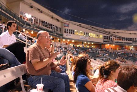 Bryan Dawson, professor of mathematics, cheers at the Diamond Jaxx game on college night at Pringles Park.  Many Union faculty and students attended for this special night. - Photo by Kristi McMurry Woody