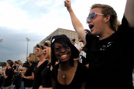 Ryan Mays, sophomore sociology major, and Melanie Taylor, freshman sports ministry major, cheer for the Union at the men's soccer game against Campbellsville University. - Photo by Sarah Palmer Goff