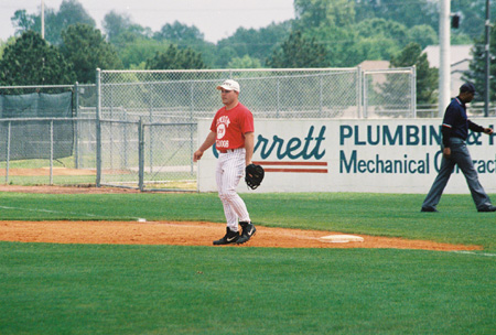 Brandon Myhand, a 1998 alumnas, plays first base during the 2003 Union Baseball Alumni Game. - Photo by Steven Aldridge