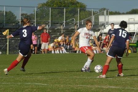 Whitney Kramer, freshman, dodges the opponent during a game against Lyon College. - Photo by Sarah Palmer Goff