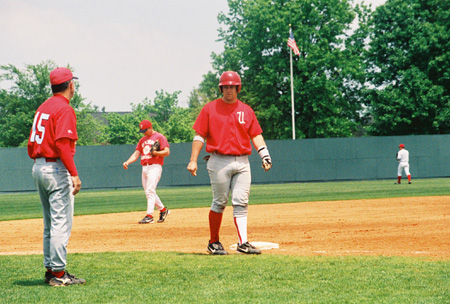 Union head coach Andy Rushing and Union first baseman Josh Allen of Jackson communicate during the 2003 Union Baseball Alumni Game (current vs. alumni). - Photo by Steven Aldridge