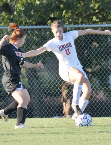 Steffi King works to keep possesion of the ball. - Photo by Tommy Sadler
