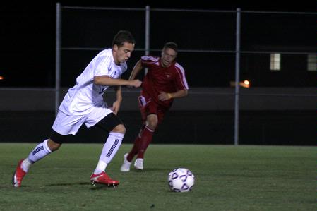 Guilherme Elvira dribbles the ball toward the goal in the game against William Carey. - Photo by Kristi McMurry Woody