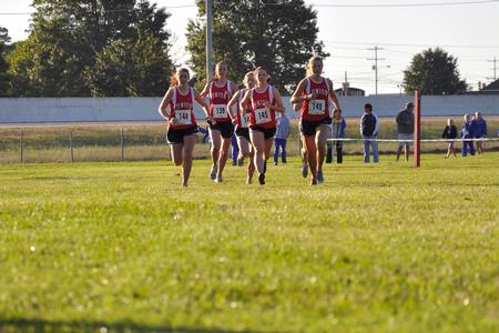 Union women's cross country teams warms up prior to the Union Cross Country Invitational. - Photo by Uncredited