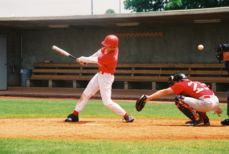 Union baseball alumnas Brady Thompson fouls off a pitch as the alumni battle the current Bulldogs.  Union catcher Marc Glass of Metropolis, Ill. is catching. - Photo by Steven Aldridge