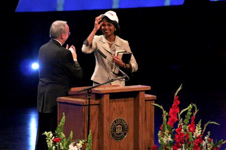 President Dockery thanks Former Secretary of State Condoleezza Rice with an NAIA Championship hat after her keynote speech at the 2009 Scholarship Banquet.  - Photo by Kristi McMurry Woody