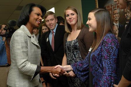Former Secretary of State Condoleezza Rice greets Autumn Baldock, junior chemistry major, outside the president's office before the 2009 Scholarship Banquet. - Photo by Beth Spain