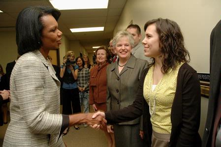 Former Secretary of State Condoleezza Rice greets Katie Shatzer, junior journalism major and <em>Cardinal & Cream</em> editor, outside the president's office before the 2009 Scholarship Banquet. - Photo by Beth Spain