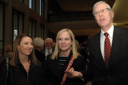 Jim Patterson, associate dean of the School of Christian Studies, talks with friends in the Civic Center lobby before the 2009 Scholarship Banquet. - Photo by Beth Spain