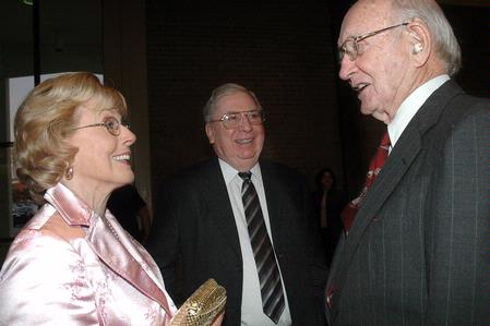 Kathy Lewis (left) talks with Joe Exum and Don Webb in the Civic Center lobby before the 2009 Scholarship Banquet. - Photo by Beth Spain