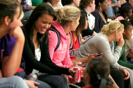 Whitney Cheong, sophomore elementary education major, laughs with friends at Bulldog Madness, an annual event that gets students and community members pumped for the upcoming basketball season. - Photo by Kristi McMurry Woody