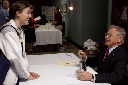 David Hackett Fischer talks with Hannah Morgan, sophomore psychology major, before signing her book at the 13th annual Carls-Schwerdfeger History Lecture Series. 
