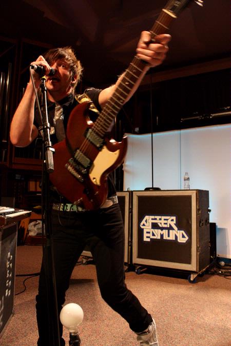 Ben Hosey, guitarist for After Edmund, performs during the homecoming concert. - Photo by Megan Bailey