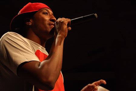 Lecrae challenges the audience with words from Paul in the book of Romans during the homecoming concert. - Photo by Megan Bailey