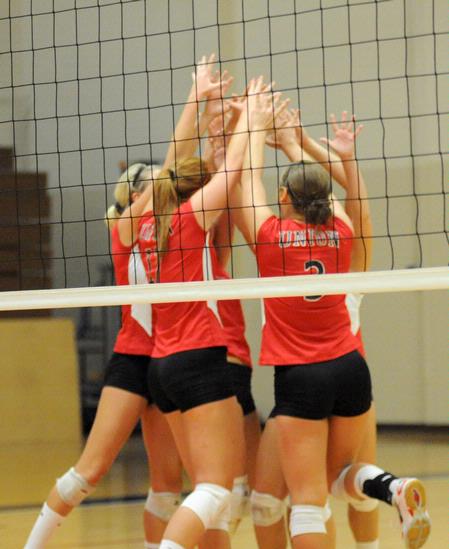 Union volleyball team celebrates a point in the 3-2 win over Bethel. - Photo by Morris Abernathy