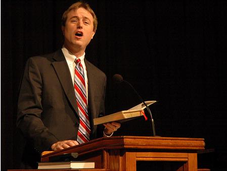 Chris Mathews, Associate Professor of Music, leads students in worship during the Founder's Day chapel service on Friday February 5, 2010 at Union University. - Photo by Jordan Buie