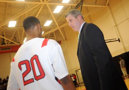 Union head coach, David Niven talks with Stan McNeil. - Photo by Morris Abernathy