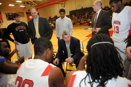 Union head coach, David Niven talks with his team during a timeout. - Photo by Morris Abernathy