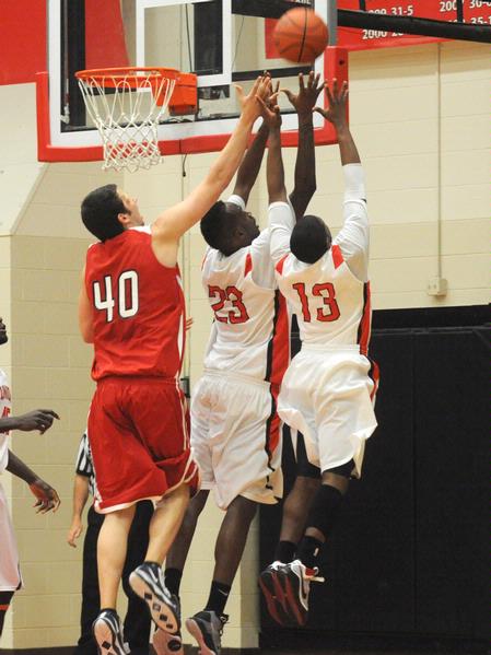 Greg Truvillion (23), Martez Hawkins (13). - Photo by Morris Abernathy