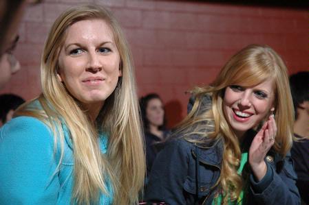 Helen Rowley (from left), freshman music major, and Katy Fraley, freshman theatre major, laugh with other students in the Bowld Commons, Sunday Feb. 7, while watching Superbowl Num. 44. - Photo by Beth Spain