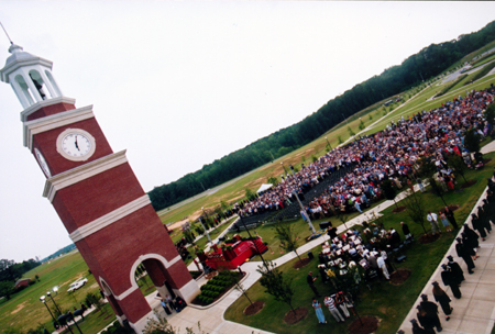 Graduates, faculty, staff, family and friends gathered on the Great Lawn for Spring Graduation 2003. - Photo by Justin Veneman