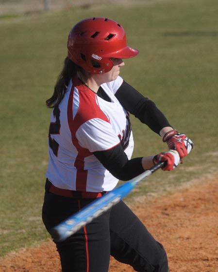 Amber Hayes, junior nursing major, swings the bat during a game Missouri Baptist University. The Lady Bulldogs won both games in the double header.  - Photo by Morris Abernathy