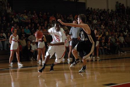 Senior Greg Truvillion drives toward the basket during the TranSouth Tournament championship game against Freed Hardeman University. The Bulldogs won 75-65. - Photo by Jordan Buie